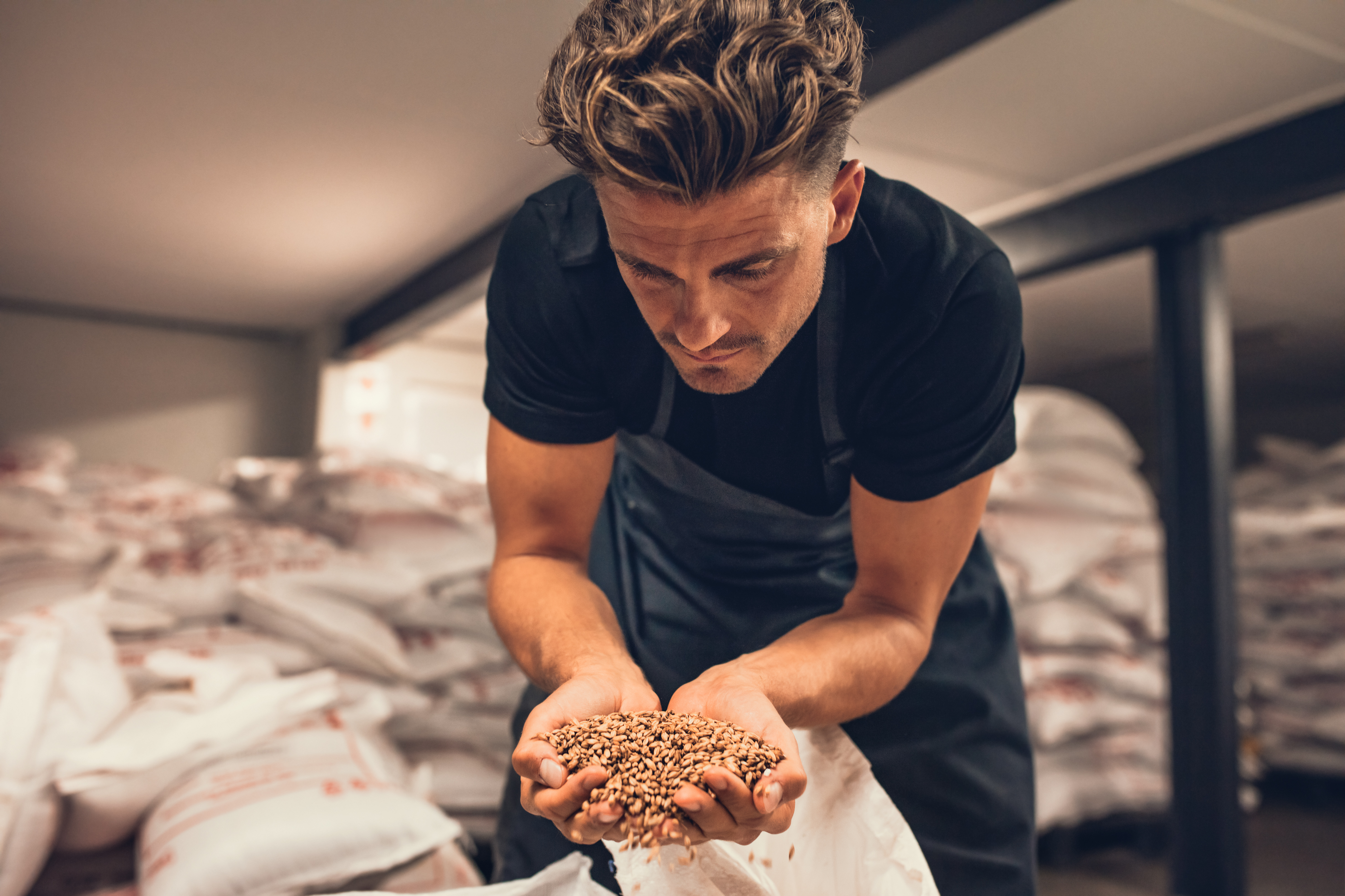 restaurant worker examining dry goods