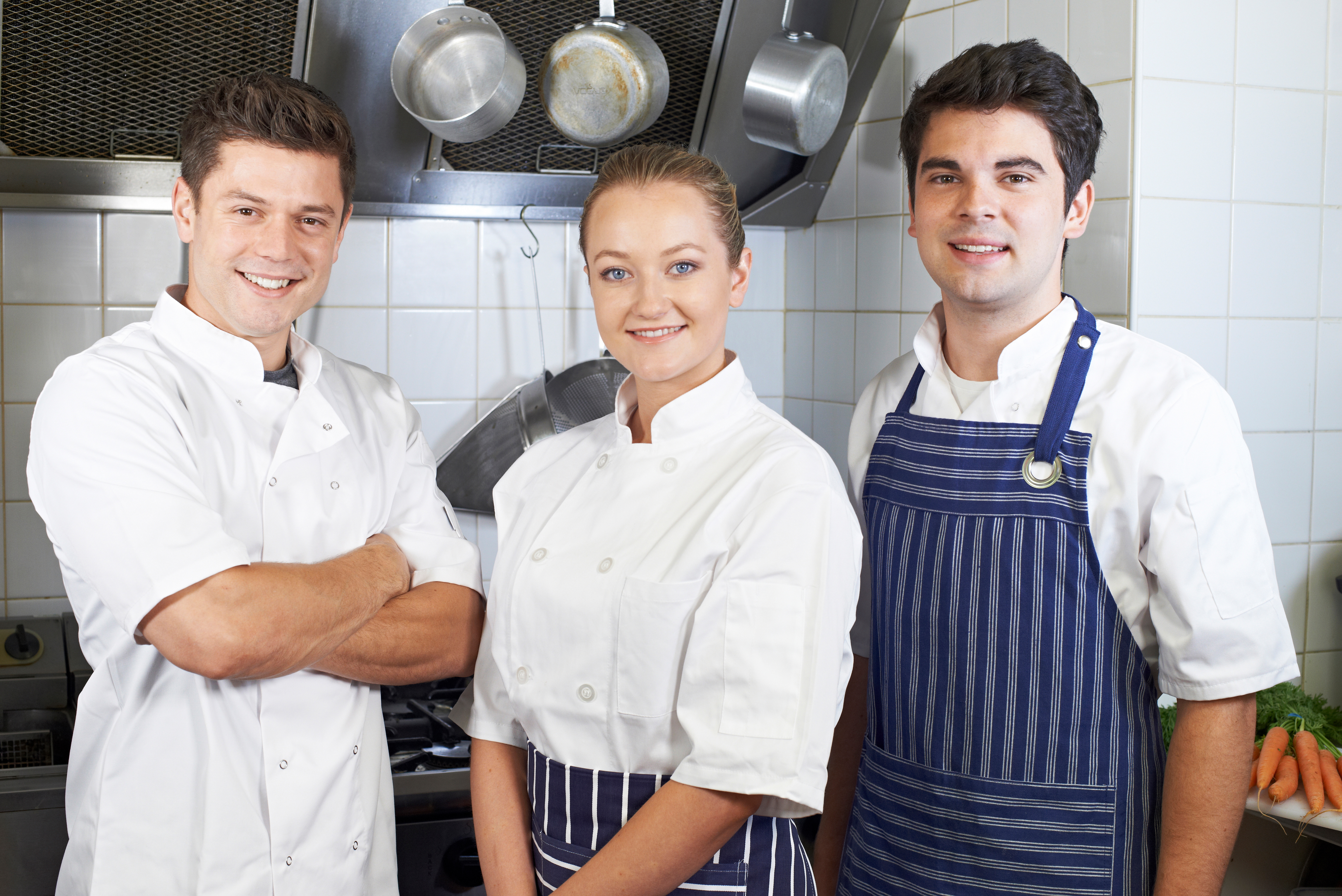 group of young food handlers in a restaurant